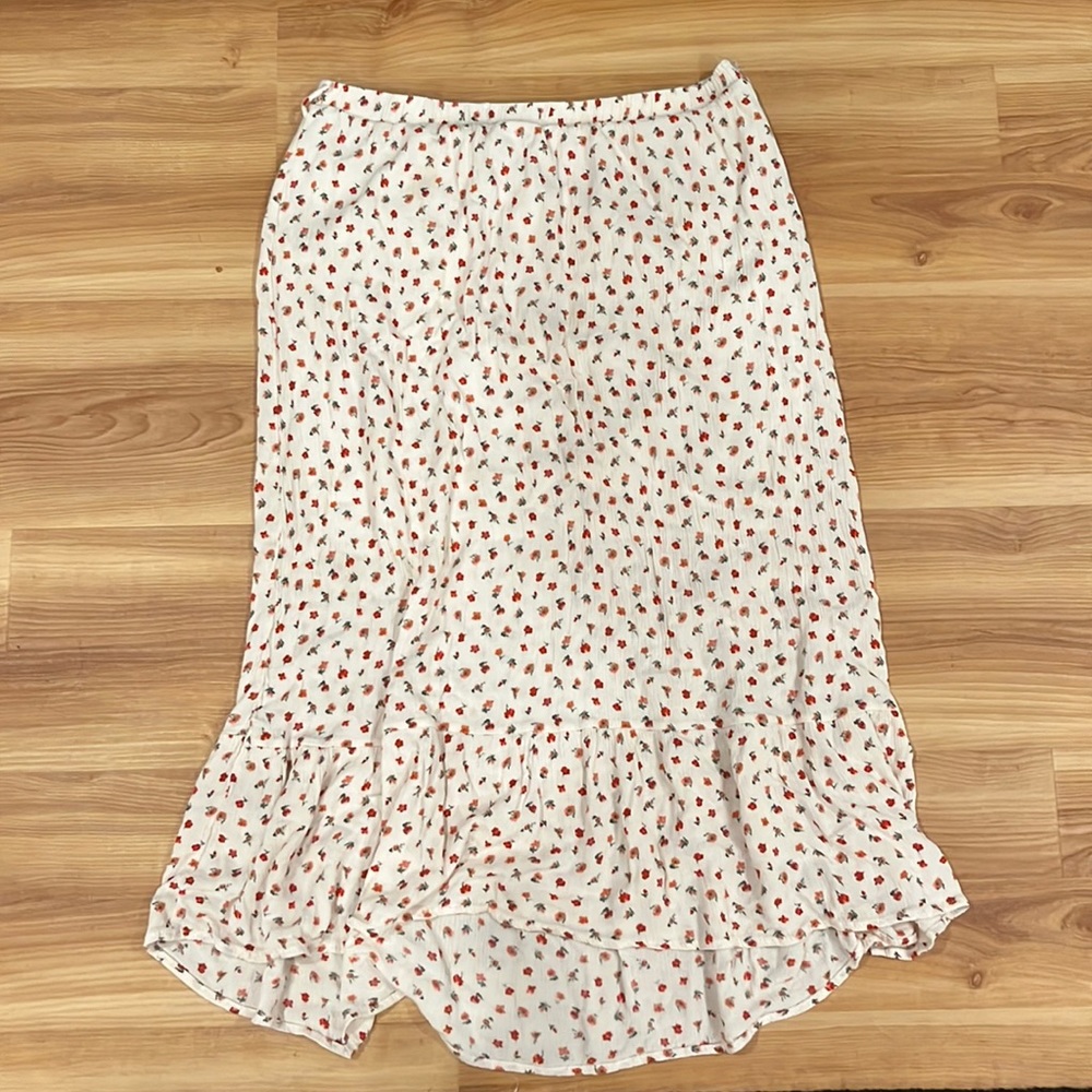 Stevie Hender, size L, mid length skirt